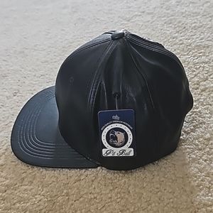 Black pleather snap back cap